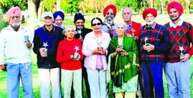 Senior citizen golfers in a jubilant mood after the prize-distribution ceremony of the Annual Fortis Healthy Heart Golf Tournament at Chandigarh Golf Club on Saturday.
