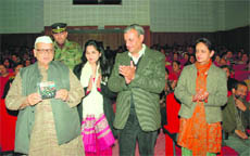 Governor Aziz Qureshi releases a documentary film on the Janusar Bawar area in Dehradun on Saturday. 