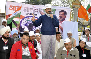 Arvind Kejriwal, national convener of the Aam Aadmi Party, addresses a workers' meeting of the AAP in Karnal on Saturday. 