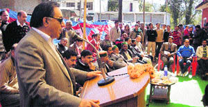 Transport Minister GS Bali addresses a public meeting at Nagrota Bagwan in Kangra on Saturday. 