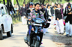 Whats the harm in wearing that helmet hanging by the vehicles handle?