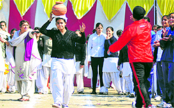 A student takes part in an event during an athletics meet at Ramgarhia Girls College in Ludhiana
