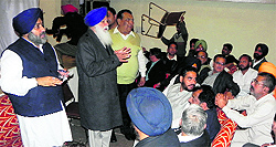Deputy Chief Minister Sukhbir Badal and SAD leader Tota Singh address a meeting of former municipal councillors in Moga on Saturday