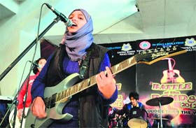 The all-girl band Pragaash performs at the Srinagar indoor stadium on December 26, 2012