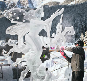 One of the participants gives final touches to his artwork