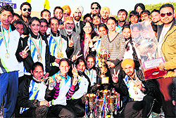 Members of Punjabi University with their trophies at All-India Inter-University Archery Championship on Sunday