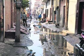 Water accumulated in a street of the Janata Colony at Sonepat on Sunday