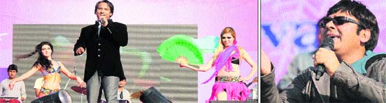 (Left) Punjabi pop singer Master Saleem performs with dancers at the winter carnival organised by Karamsheel Charitable Trust at Maulana Azad Stadium in Jammu on Sunday. Comedian Sudesh Lehri at the show