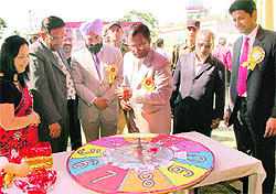 Chief Parliamentary Secretary Som Parkash at a stall during a fete in DAV College, Phagwara, on Sunday