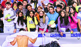 Rafael Nadal towels during a break, exciting his female fans.