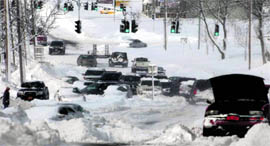Stranded vehicles in Lake Grove, New York, on Saturday.