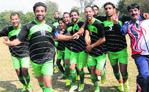 The Jammu and Kashmir team in a jubilant mood after winning a football match of the All-India Forest Games at Sector 17, Chandigarh, on Monday.