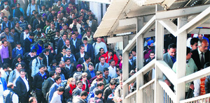 Passengers climb the stairs from Platform No. 4 to come out of the station on Monday.
