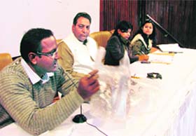 Dehradun District Magistrate BVRC Purushottam, along with Mayor Vinod Chamoli, holds a meeting with officials on polythene ban in Dehradun on Monday