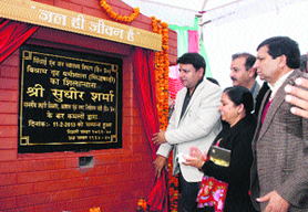 Urban Development Minister Sudhir Sharma lays the foundation stone of IPH rest house at Sidhbari in Dharamsala on Monday.