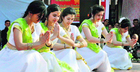Artistes from Kazakhstan perform at the 27th Surajkund International Crafts Mels in Faridabad.