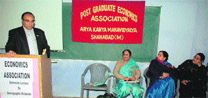 Prof MM Goel, Dean, Faculty of Social Sciences, KU, addresses a seminar at Arya Kanya Mahavidyalaya in Shahabad Markanda.