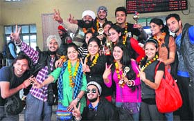 Students of Apeejay College of Fine Arts show their trophies which they recently won at a national-level youth festival