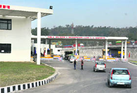 Traffic at the toll plaza built at the cost of Rs 42.58 crore at Lakhanpur in Jammu. 