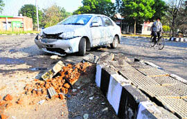 The car that hit the road divider near PAU on late Sunday night in Ludhiana.