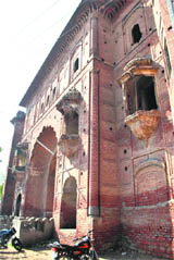 The Art and Medal Gallery inside the Sheesh Mahal, which is out of bound for visitors and an outer view of the Sheesh Mahal.