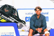 Rafael Nadal sits in shock after losing to Argentinas Horacio Zeballos in the final of the Chilean Open in Vina del Mar on Sunday evening. Zeballos won 6-7 7-6 6-4 to claim the first title of his career.