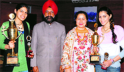 Members of GNDU youth festival team pose with Vice-Chancellor AS Brar after bagging runners- up trophy at Inter-University National Youth Festival, in Amritsar on Tuesday. A Tribune photograph