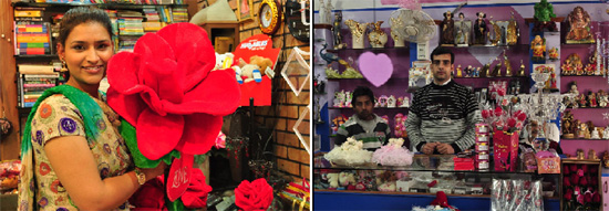 A girl poses with a big velvet rose available at one of the gift shops in the city. Manoj Verma, owner of another gift shop, shows off the items on offer for the Valentine Week.