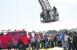 Arrangements on for a mega mock drill at Government College, Phase VI, Mohali, on Tuesday.