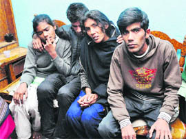 Grief-striken family members at Mauli Jagran in Chandigarh on Tuesday.