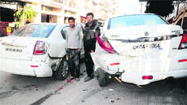 Damaged cars parked in Sector 42, Chandigarh, on Tuesday. 
