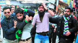 Kashmiri students being beaten up by shopkeepers of the Indira Nagar market in Dehradun on Tuesday.