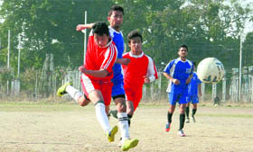 Players in action during a match in the 21st Narayan Gurung (Zics) Memorial Football Tournament in Dehradun on Tuesday.