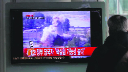 A South Korean man watches TV news showing footage of North Koreas nuclear test in Seoul on Tuesday.