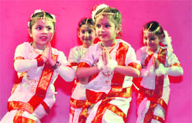 Students perform on stage during the annual function of Euro Kids school in Jammu on Tuesday.