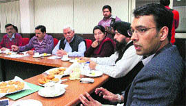 Director Local Bodies Priyank Bharti holds a meeting on property tax with the MC authorities in Jalandhar on Tuesday.