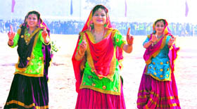 Students of Lovely Professional University perform a dance during the annual sports meet near Jalandhar.