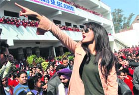 Striking a chord: Punjabi actor Surveen Chawla performs at a private school in Patiala for the promotion of her new film, on Tuesday