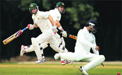 Ed Cowan and Matthew Wade during a two-day practice match against the Board President's XI on Tuesday.  PTI 