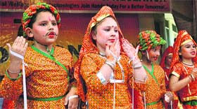 Children perform on the stage during the Annual Day function of Model Institute of Education & Research, BC Road, Jammu, on Wednesday