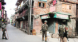 CRPF personnel in curfew-bound Srinagar on Wednesday