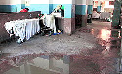 Water gets collected on the floor outside the bathroom of the maternity ward of the Civil Hospital in Jalandhar on Wednesday