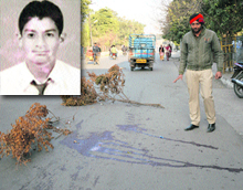A policeman covers the crime spot with tree branches in Ludhiana on Wednesday; and (inset) a file photo of the victim, Shivam.