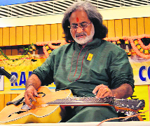 Pandit Vishwa Mohan Bhatt performs at Ramgarhia Girls College in Ludhiana on Wednesday.