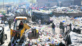 An anti-encroachment drive under way at Sector 25 in Chandigarh.