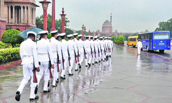 Navy personnel outside South Block, that houses the Ministry of Defence, in New Delhi.