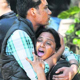 Relatives mourn the death of kin in an accident in Karnal on Thursday