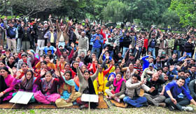 Employees protest on jammu University campus on Thursday.