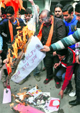Activists of Shiv Sena burnt Valentines Day cards in Jammu on Thursday.