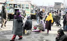 People come out of their houses after the partial relaxation in curfew.